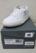 A pair of boxed as new New Balance 550 trainers in white (UK 5).