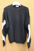 A chunky Banned knit black jumper (S).