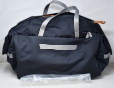 An as new Bellroy Classic Weekender Bag 45L in Slate.