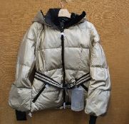 An as new Goldbergh Grace padded ski jacket in Gold (UK 10).