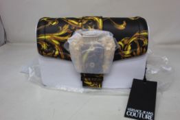 An as new Versace Couture Range F Sketch Handbag.