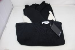 A chunky Banned knit black jumper (XL).