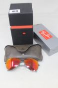A pair of Ray Bans Aviator large metal sunglasses with case.