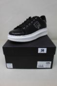 A pair of as new Karl Lagerfeld Kapri Karl Trainers in Black Leather (Size UK 8).