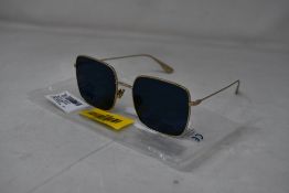 An as new pair of Christian Dior Stellaire1Xs Blue Lens Sunglasses with Gold Frame (EAN: