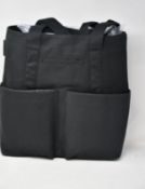 A Dagne Dover Pacific Tote onyx bag with dust bag.