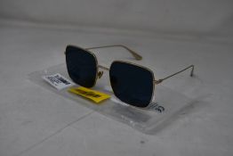 An as new pair of Christian Dior Stellaire1Xs Blue Lens Sunglasses with Gold Frame (EAN: