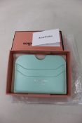 Three boxed as new Acne Studios Leather Card Holders in Pastel Green.