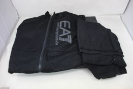 An as new EA7 Emporio Armani Tracksuit in Black (Size U: XXL/E: XXL).