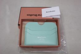 Three boxed as new Acne Studios Leather Card Holders in Pastel Green.