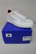 A pair of women's boxed as new P448 Thea Shabby Sneakers in white (EU 38).