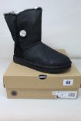A pair of women's boxed as new UGG Bailey Button Bling Boots in black (UK 6).