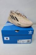A pair of boxed as new Adidas Ozelia Sneakers in brown GX4029 (UK 7.5).