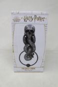 Twenty four boxed as new Harry Potter - The Dark Mark Door Knocker Accessories (Wizarding World).