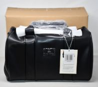 An as new Nova Harley Luxury Manhattan leather changing bag.