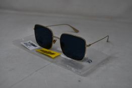 An as new pair of Christian Dior Stellaire1Xs Blue Lens Sunglasses with Gold Frame (EAN:
