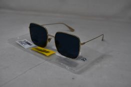 An as new pair of Christian Dior Stellaire1Xs Blue Lens Sunglasses with Gold Frame (EAN: