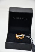A men's boxed as new Versace Chained Medusa Ring.