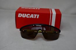 A pair of Ducati sunglasses (DA025) (002 139 0-120).