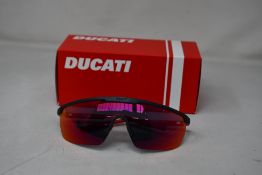 A pair of Ducati sunglasses (DA025) (932 139 0-120).