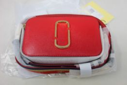 An as new Marc Jacobs The Snapshot true red multi leather camera bag.
