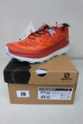 A pair of as new Salomon Ultra Glide W in Mecca Orange/Red Orange/Crystal Blue (Size UK 7.5).