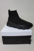 A pair of women's boxed as new Kurt Geiger London Lettie Knit Sock Drench Trainers in black (EU