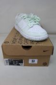 A pair of women's as new Nike Dunk Low Next Nature in White/Barely Green (Size UK 6).