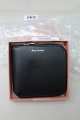 Three boxed as new Acne Studio Zippered Wallets in Black.