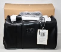 An as new Nova Harley Luxury Manhattan leather changing bag.