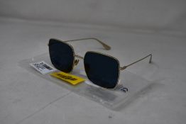 An as new pair of Christian Dior Stellaire1Xs Blue Lens Sunglasses with Gold Frame (EAN:
