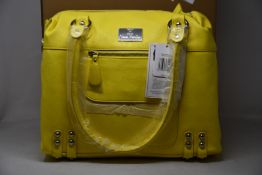 An as new Nova Harley Luxury Devine leather bag.