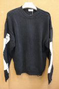 A chunky Banned knit black jumper (XL).