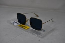 An as new pair of Christian Dior Stellaire1Xs Blue Lens Sunglasses with Gold Frame (EAN: