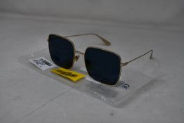 An as new pair of Christian Dior Stellaire1Xs Blue Lens Sunglasses with Gold Frame (EAN: