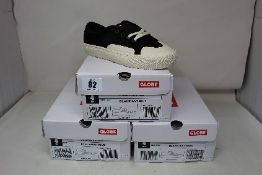 Three pairs of boxed as new Globe Surplus Kids Skate Shoes in black/antique (USA 4).