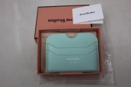 Three boxed as new Acne Studios Leather Card Holders in Pastel Green.