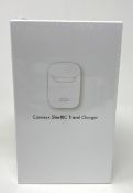 A boxed as new Connexx Slim-RIC Travel Charger (REF: 10981008) (Box sealed).