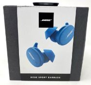 A boxed as new pair of Bose Sport Earbuds in Baltic Blue (Box sealed, some cosmetic damage to box).