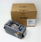 A pre-owned Zebra ZD41022-D0E000EZ 2” 203dpi Thermal Label Printer (Boxed. PSU included).