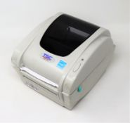 An as new TSC TDP-247 Direct Thermal Desktop Label Printer (PSU included. No Box).