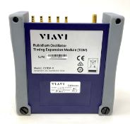A pre-owned Viavi C5TEM-R Rubidium Oscillator Timing Expansion Module with a Taoglas AA.171 Antenna,