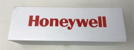 A boxed as new Honeywell CT40-NB 4-Slot Docking Station with PSU and EU power cable included (P/N: C