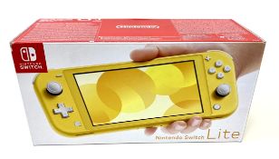 A boxed as new Nintendo Switch Lite Console in Yellow (M/N: HDH-S-YAZAA-UKV).