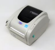 An as new TSC TDP-247 Direct Thermal Desktop Label Printer (PSU included. No Box).