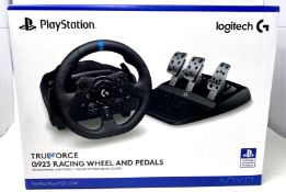 A boxed as new Logitech G923 Trueforce Sim Racing Wheel and Pedals for Sony PS4/5 & PC (P/N: 941-000