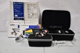 A pair of as new Orasoptics 3.5x Loupes glasses with Zeon Endeavour TruColor.