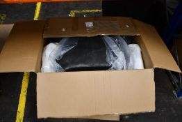 A boxed as new My Home Stories velvet armchair with gold tipped legs in charcoal.