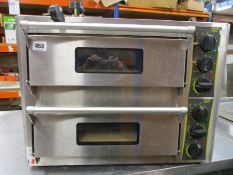 A pre-owned Roller grill double deck pizza oven.
