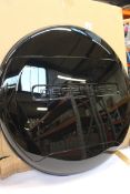 A boxed Land Rover Defender OEM wheel cover.